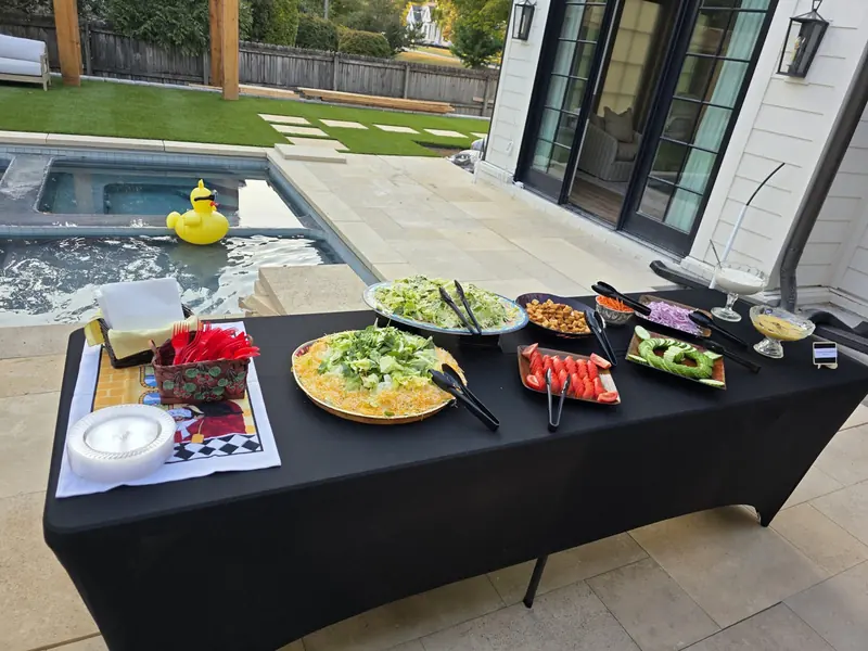 Outdoor buffet line set up on a patio