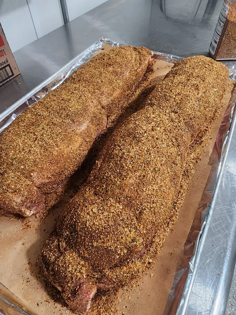 Seasoned brisket prepped in a pan