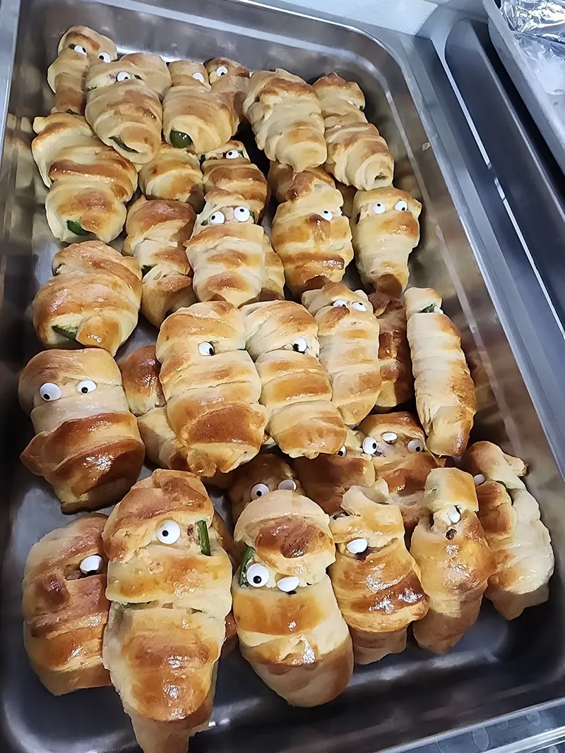 Mummy Dogs wrapped in crescent dough with candy eyes